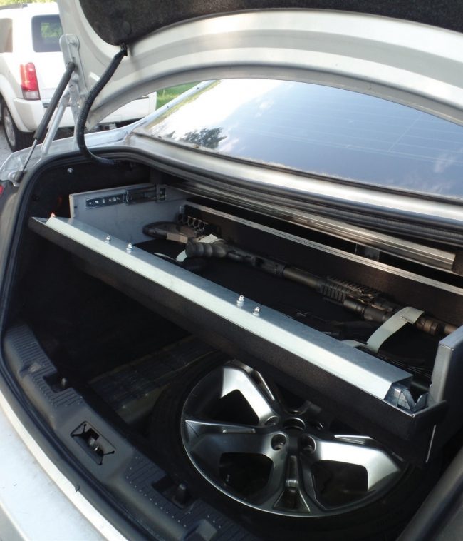 sedan weapon locker open